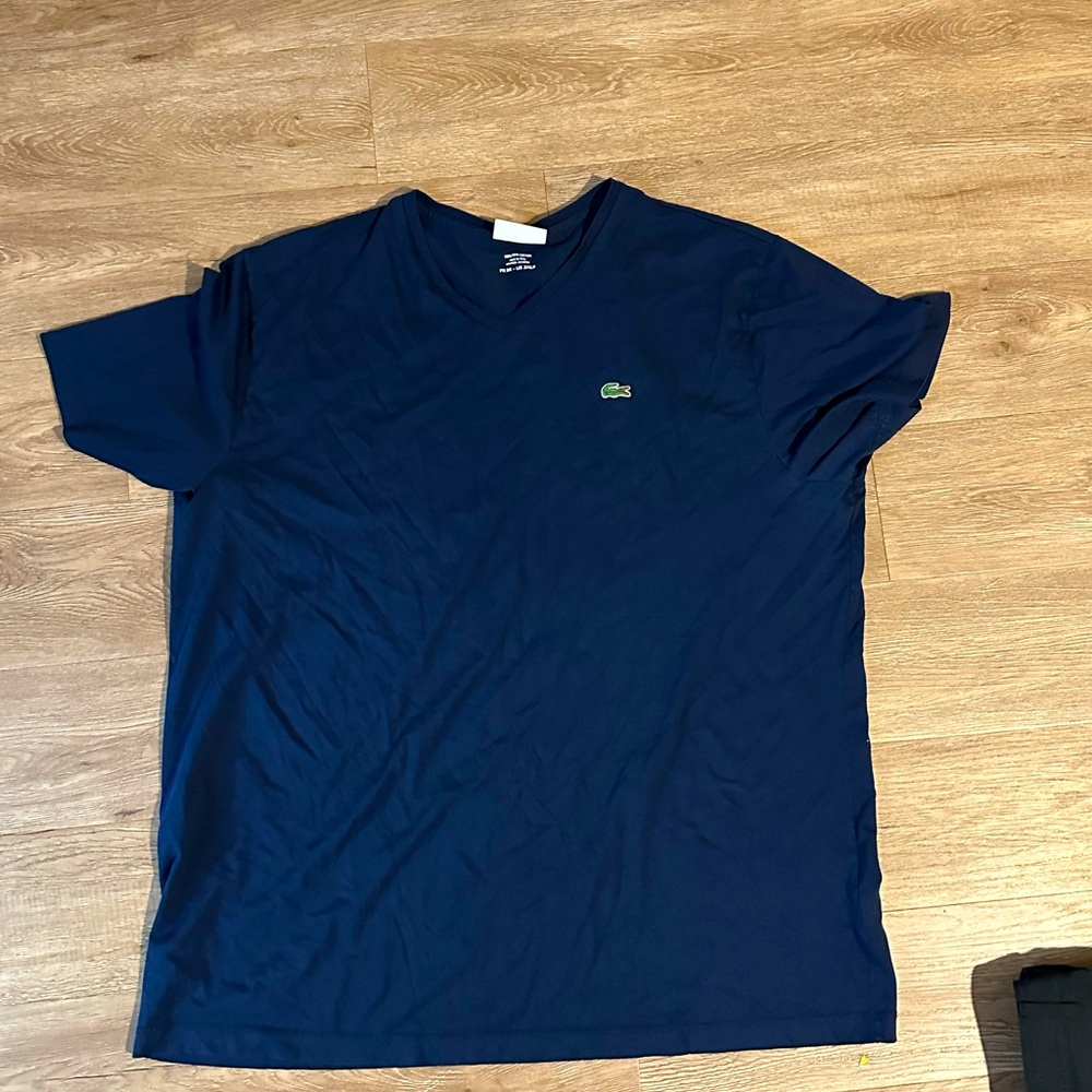 Lacoste navy v neck. Beautiful color. Great condition.